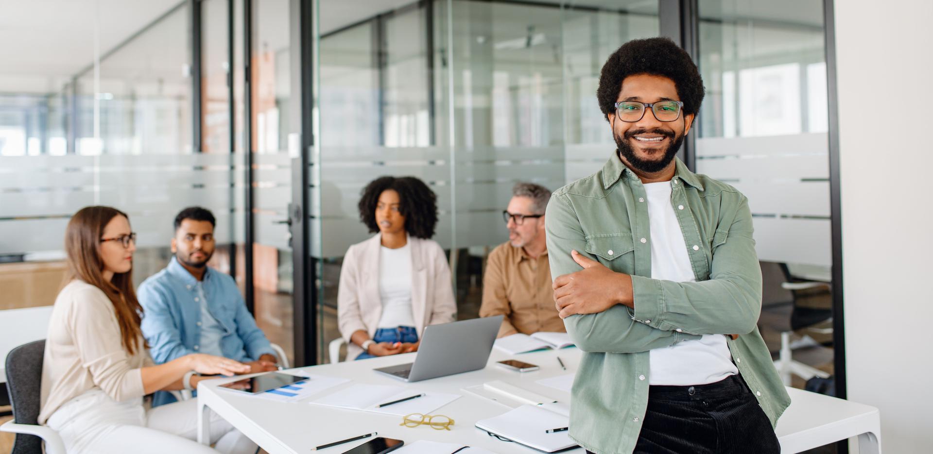 Business professionals actively discussing ideas and strategies during a corporate meeting.